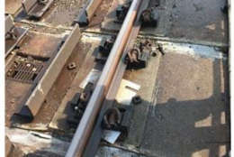Failing rail fasteners and mismatched pieces of rail were among the most serious defects uncovered by Federal Transit Administration inspectors in a new series of reports released Friday. Other issues included repeated pooling of water near cables, some tunnels that are still far too dark and emergency exit paths that are blocked by cables or debris. (Courtesy FTA)