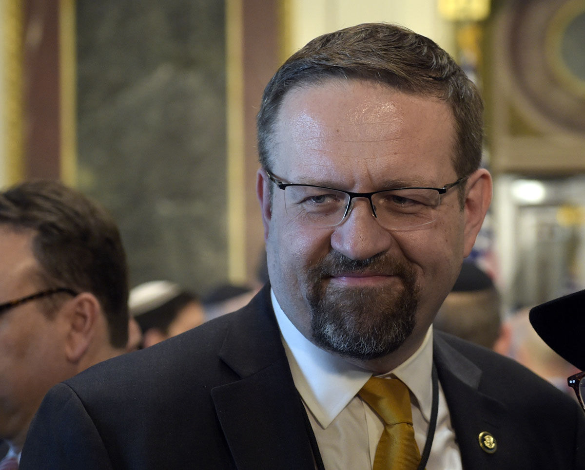 Deputy assistant to President Trump Sebastian Gorka talks with people in the Treaty Room in the Eisenhower Executive Office Building on the White House complex in Washington, Tuesday, May 2, 2017, during a ceremony commemorating Israeli Independence Day. (AP Photo/Susan Walsh)