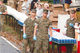 Marines at water point at Rock Creek Parkway. Year not known. (Courtesy Marine Corps Marathon)