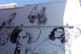 From left: Muhammad Ali, Prince, Harriet Tubman and the Obamas are among the new faces on the mural. (WTOP/Kate Ryan)