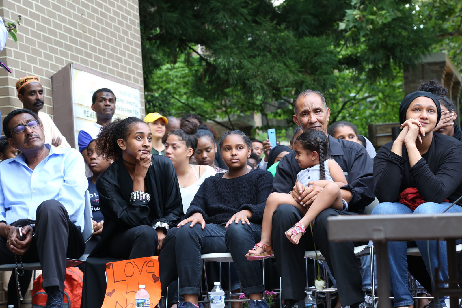Nabra Hassanen's family looks on at a vigil in honor of Nabra on Wednesday, June 21, 2017, in Reston, Va.
 (WTOP/Omama Altaleb)