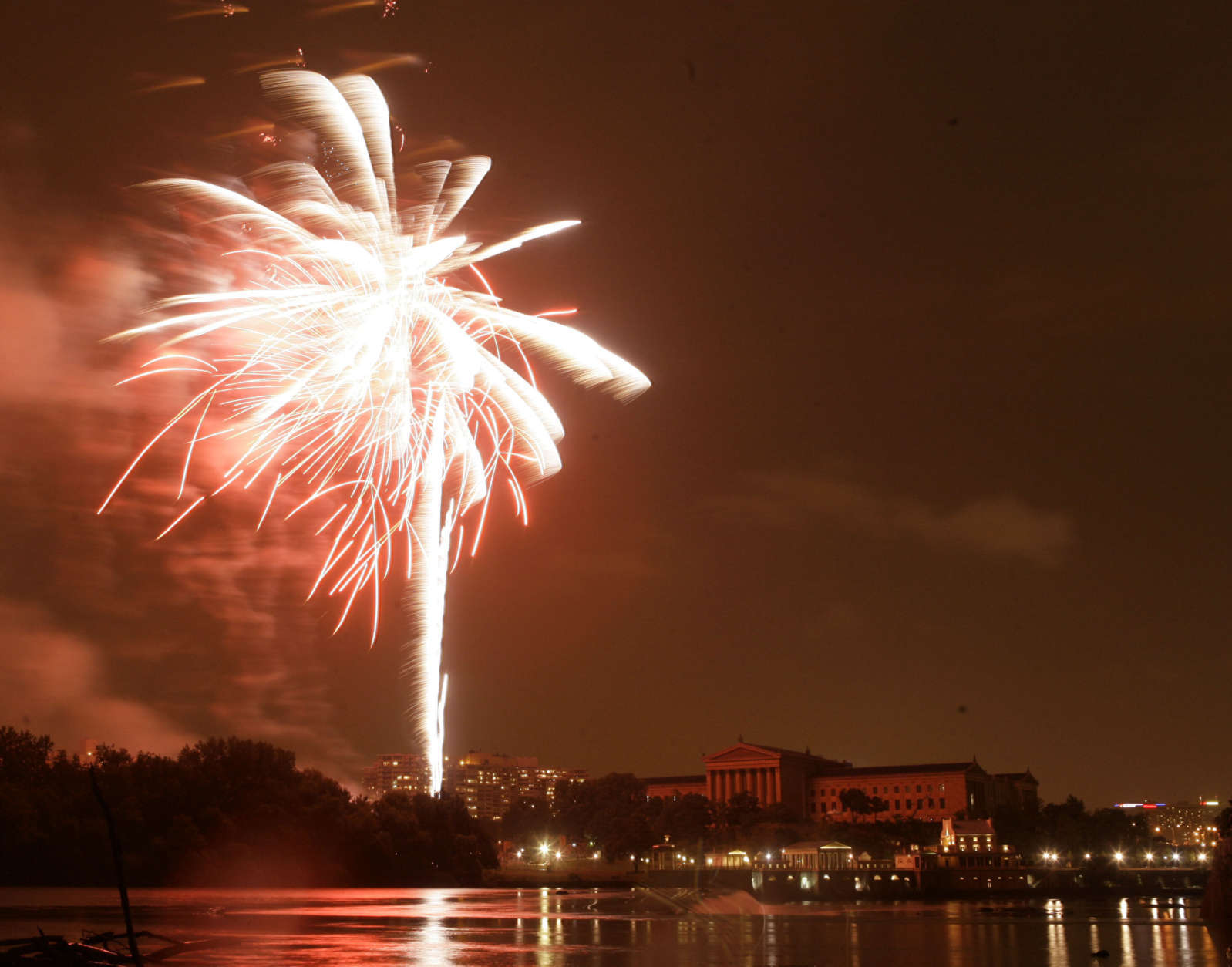Fireworks explode over the Philadelphia Museum of Art during an Independence Day celebration in Philadelphia on Wednesday, July 4, 2007. (AP Photo/Matt Rourke)