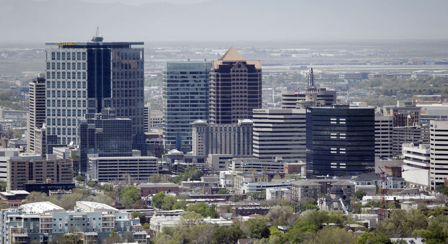 This Friday, April 22, 2016, photo, shows the skyline of Salt Lake City. A new report raising the likelihood of a destructive earthquake striking Salt Lake City in the next half century has underscored the urgency to retrofit more than 30,000 older brick homes and other unreinforced buildings at high risk of collapsing. (AP Photo/Rick Bowmer)