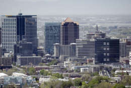 This Friday, April 22, 2016, photo, shows the skyline of Salt Lake City. A new report raising the likelihood of a destructive earthquake striking Salt Lake City in the next half century has underscored the urgency to retrofit more than 30,000 older brick homes and other unreinforced buildings at high risk of collapsing. (AP Photo/Rick Bowmer)