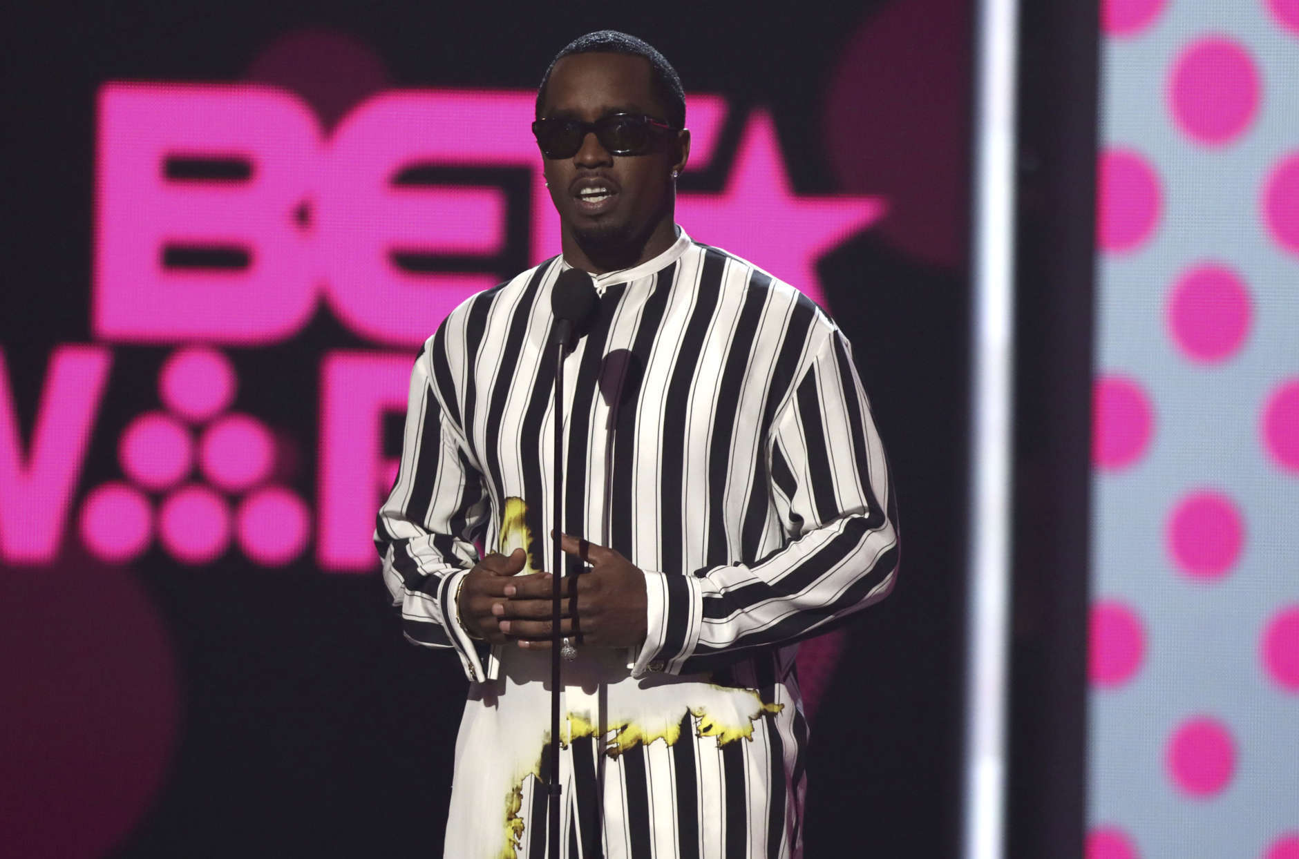 Sean "Puff Daddy" Combs presents the award for best new artist at the BET Awards at the Microsoft Theater on Sunday, June 25, 2017, in Los Angeles. (Photo by Matt Sayles/Invision/AP)