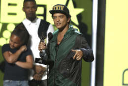 Bruno Mars accepts the award for best male R&amp;B/pop artist at the BET Awards at the Microsoft Theater on Sunday, June 25, 2017, in Los Angeles. (Photo by Matt Sayles/Invision/AP)