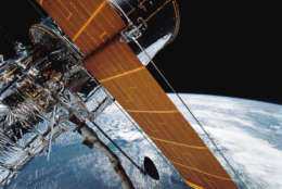 On June 27, 1990, NASA announced a flaw in the orbiting Hubble Space Telescope was preventing the instrument from achieving optimum focus. (The problem was traced to a mirror that had not been ground to exact specifications; corrective optics were later installed to fix the problem.) (AP Photo)

In this April 25, 1990 photograph provided by NASA, most of the giant Hubble Space Telescope can be seen as it is suspended in space by Discovery's Remote Manipulator System (RMS) following the deployment of part of its solar panels and antennae. This was among the first photos NASA released on April 30 from the five-day STS-31 mission.  The Hubble Space Telescope, one of NASA'S crowning glories, marks its 25th anniversary on Friday, April 24, 2015. With more than 1 million observations, including those of the farthest and oldest galaxies ever beholden by humanity, no man-made satellite has touched as many minds or hearts as Hubble.  (NASA via AP)