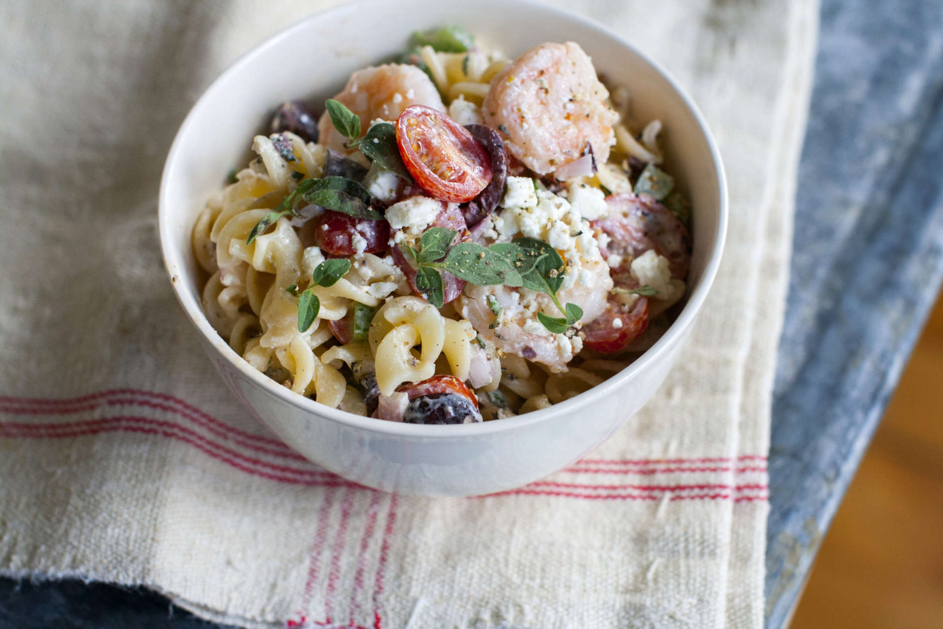 This May 5, 2014 photo shows Greek shrimp and feta pasta salad in Concord, N.H. (AP Photo/Matthew Mead)