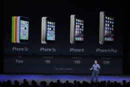Phil Schiller, Apple's senior vice president of worldwide product marketing, talks about new features on the new iPhone 6 on Tuesday, Sept. 9, 2014, in Cupertino, Calif. (AP Photo/Marcio Jose Sanchez)