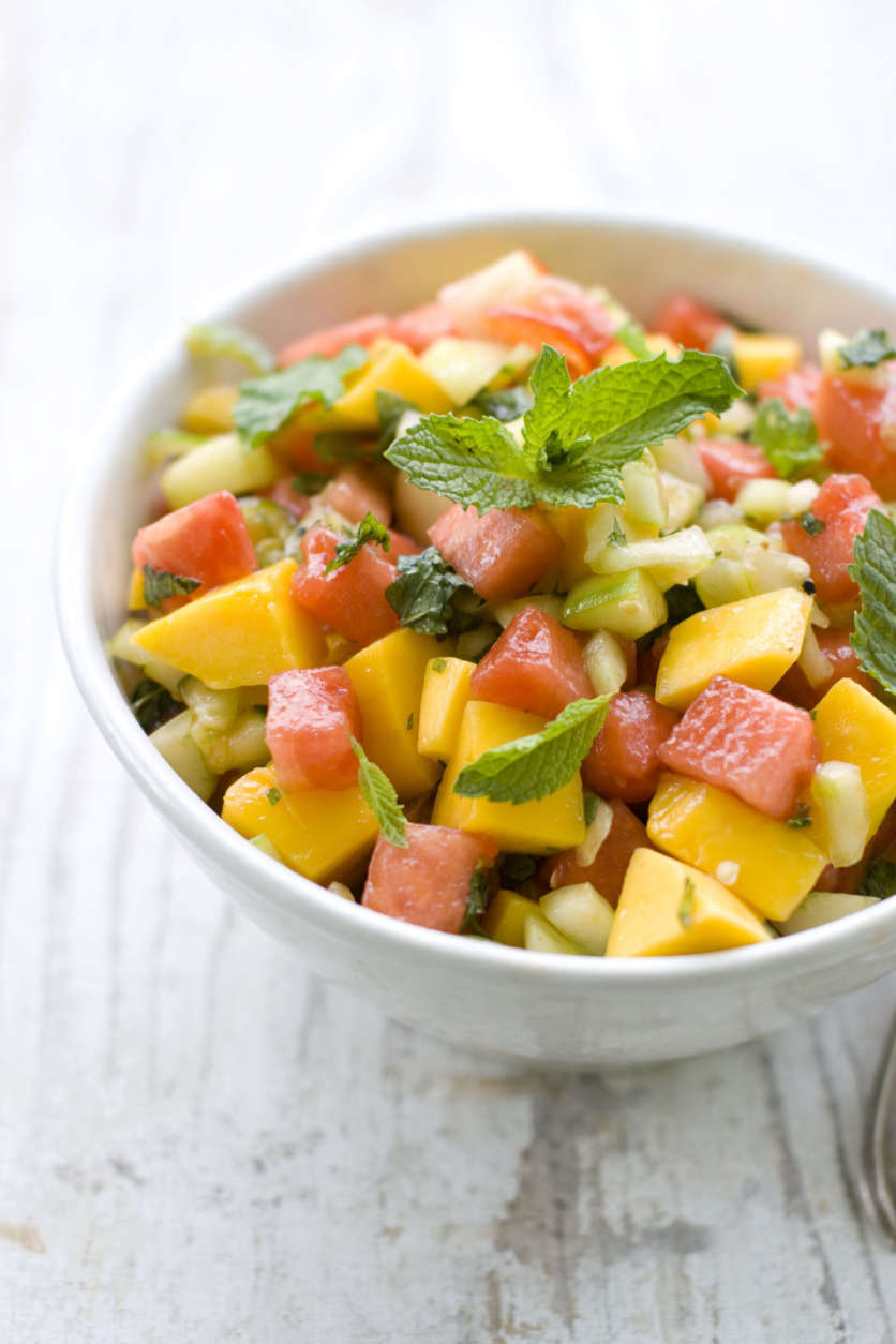 In this image taken on July 24, 2012, Arthur Potts Dawson's cucumber, watermelon and mango salad with spicy red and green chilies is shown served in a bowl in Concord, N. H. (AP Photo/Matthew Mead)