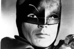 FILE -- In this Jan. 23, 1966 file photo, actor Adam West, stars as the Caped Crusader battling the forces of evil on the new "Batman" television series. "Batman: The Complete Television Series," available in limited edition Blu-ray as well as DVD and digitally, releases this week and includes the 120 original ABC broadcast episodes with guest stars that ranged from Liberace to Vincent Price to Bruce Lee. Three hours of new content includes interviews with West and co-star Burt Ward. (AP Photo, File)