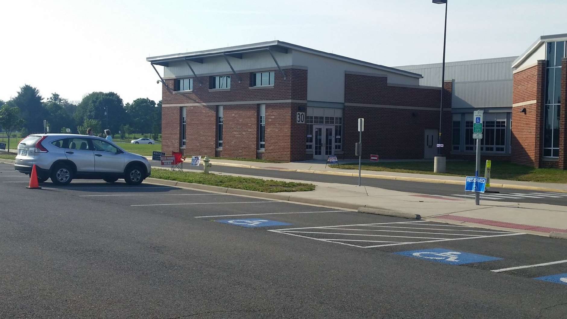 The polling station at Patriot High School in Nokesville is pretty quiet as of 10 a.m. Tuesday. (WTOP/Kathy Stewart)