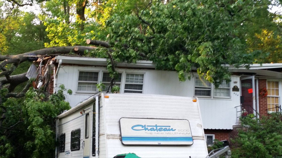 This home on Dennis Ave. was deemed unsafe after trees fell on it Monday from the severe storm. It's the Northwood Park area in Silver Spring,
 Maryland. (WTOP/Kathy Stewart)