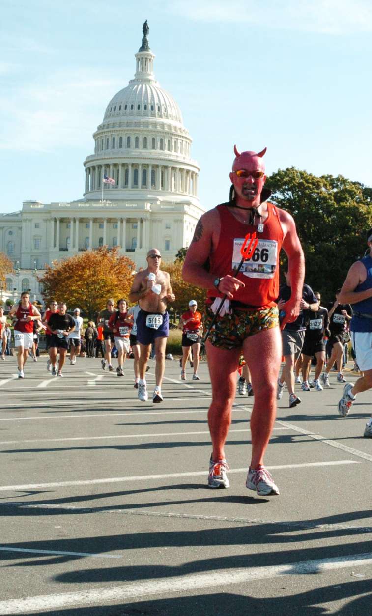 A runner dressed as a devil takes on the National Mall in the 2009 Marine Corps Marathon. (Courtesy Marine Corps Marathon)