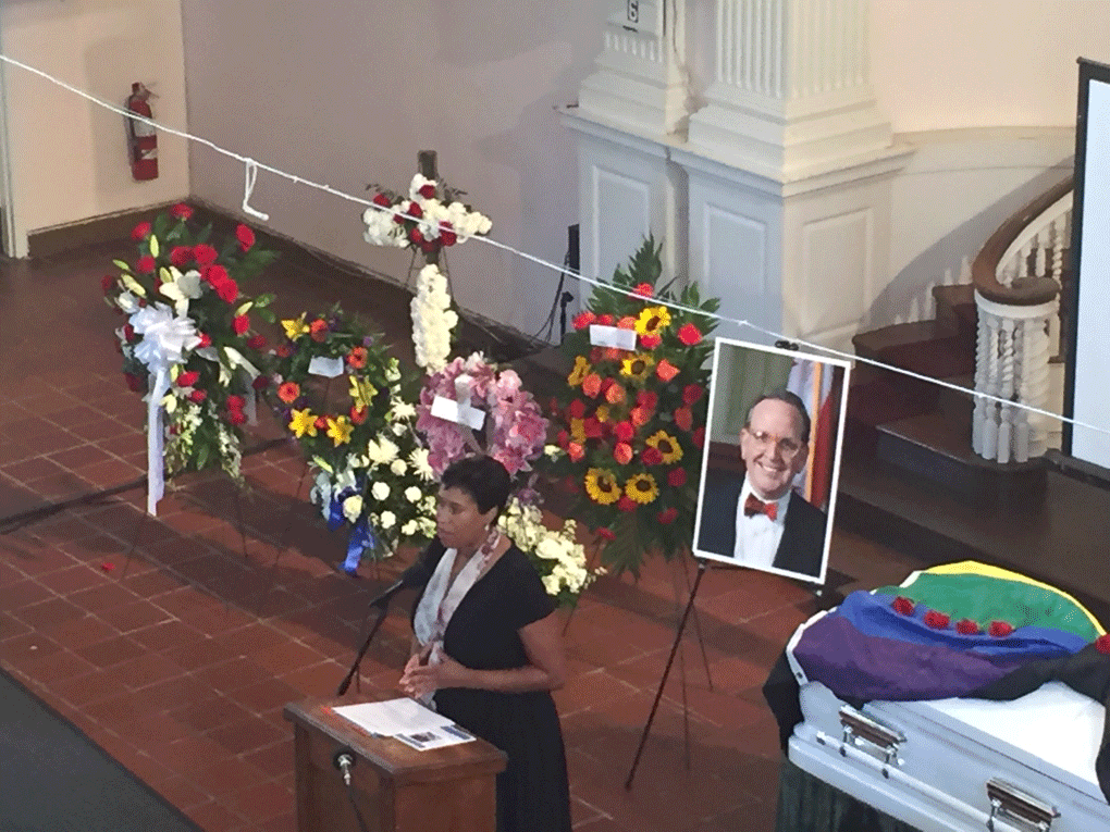 D.C. Mayor Muriel Bowser speaks at former councilmember Jim Graham's funeral services Saturday. (WTOP/John Domen)