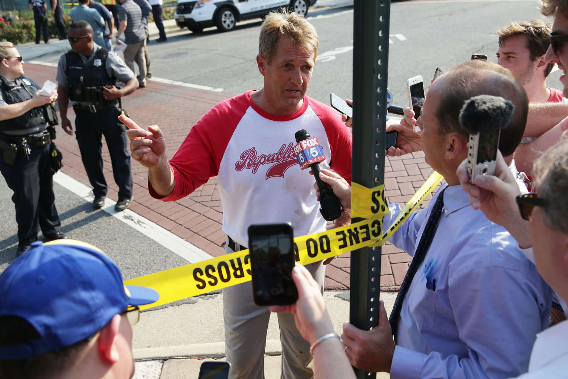 ALEXANDRIA, VA - JUNE 14:  U.S. Sen. Jeff Flake (R-AZ) briefs members of the media near Eugene Simpson Stadium Park where a shooting took place on June 14, 2017 in Alexandria, Virginia. U.S. House Majority Whip Rep. Steve Scalise (R-LA) and multiple congressional aides were shot by a gunman during a Republican baseball practice.  (Photo by Alex Wong/Getty Images)
