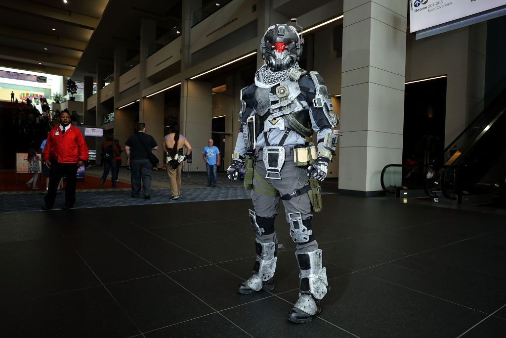 Kyle Spittle, 20, of Warrenton, VA, wears a Titan Fall Pilot costume during the first day of Awesome Con at the Walter E. Washington Convention Center June 16, 2017 in Washington, DC. Thousands of fans of popular culture, fantasy and science fiction will gather for the three-day convention that includes comic books, collectibles, toys, games, original art, cosplay and Marvel Comics legend Stan Lee.  (Photo by Chip Somodevilla/Getty Images)