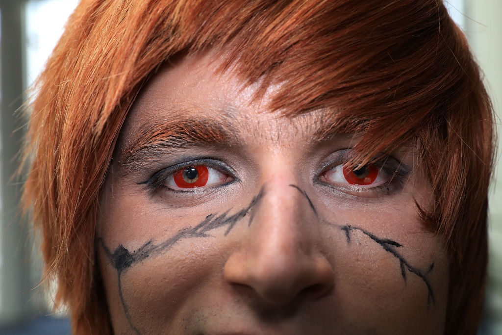 Ben Wharton, 22, of Baltimore, MD, dresses as the character Light from the popular Death Note comic during the first day of Awesome Con at the Walter E. Washington Convention Center June 16, 2017 in Washington, DC. Thousands of fans of popular culture, fantasy and science fiction will gather for the three-day convention that includes comic books, collectibles, toys, games, original art, cosplay and Marvel Comics legend Stan Lee.  (Photo by Chip Somodevilla/Getty Images)