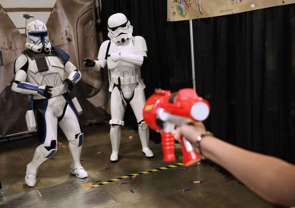 Members of the 501st Legion, a Star Wars cosplay group, help raise money for charity by letting people shoot Nerf darts at them during the first day of Awesome Con at the Walter E. Washington Convention Center June 16, 2017 in Washington, DC. Thousands of fans of popular culture, fantasy and science fiction will gather for the three-day convention that includes comic books, collectibles, toys, games, original art, cosplay and Marvel Comics legend Stan Lee.  (Photo by Chip Somodevilla/Getty Images)