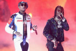 LOS ANGELES, CA - JUNE 25: Quavo (L) and Offset of Migos perform onstage at 2017 BET Awards at Microsoft Theater on June 25, 2017 in Los Angeles, California. (Photo by Frederick M. Brown/Getty Images )