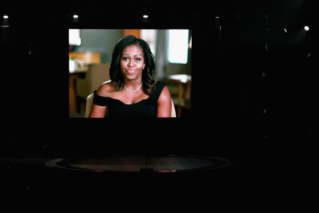 LOS ANGELES, CA - JUNE 25: Michelle Obama speaks onscreen at 2017 BET Awards at Microsoft Theater on June 25, 2017 in Los Angeles, California.  (Photo by Frederick M. Brown/Getty Images )