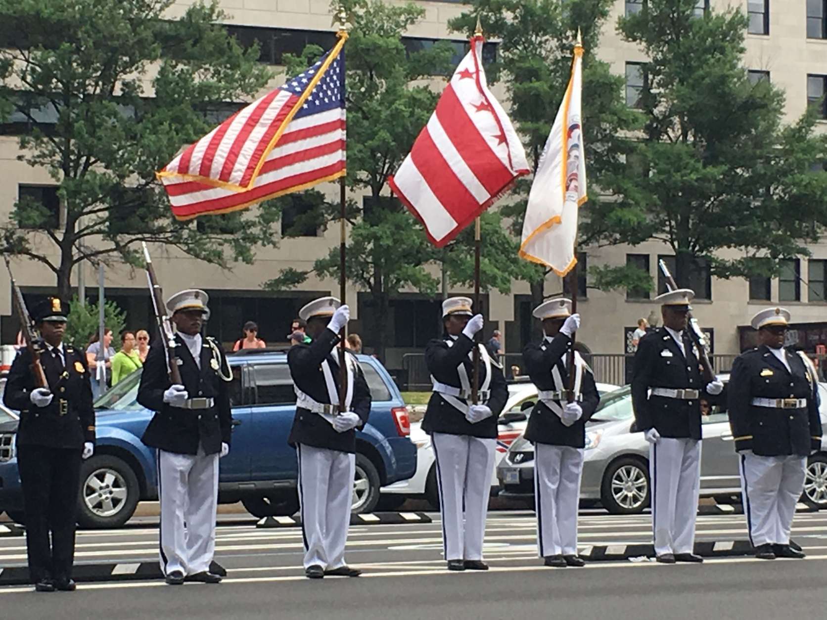 An honor guard for Jim Graham outside the Wilson Building. (WTOP/Kate Ryan)
