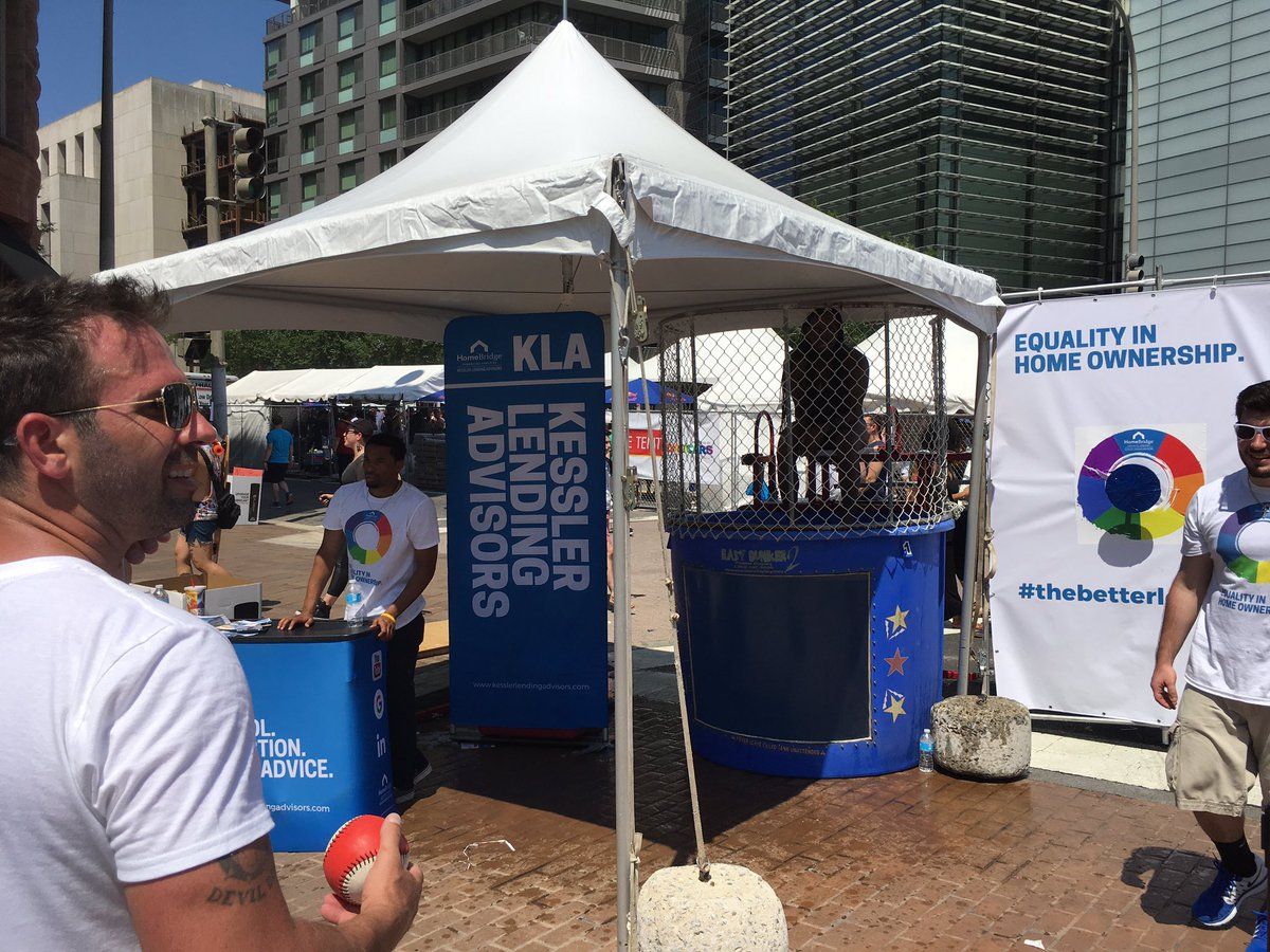 Some activities included a dunking booth--the perfect way to cool down on Sunday when temperatures hit the 90s. (WTOP/Liz Anderson) 