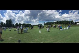 Both the driving range (pictured) and main putting green are easily accessible to fans, a change from the layout at Congressional Country Club. (WTOP/Noah Frank)