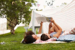 Having your kids read is one way to ensure they aren’t letting their brains rust in the summer sun.  (Thinkstock)
