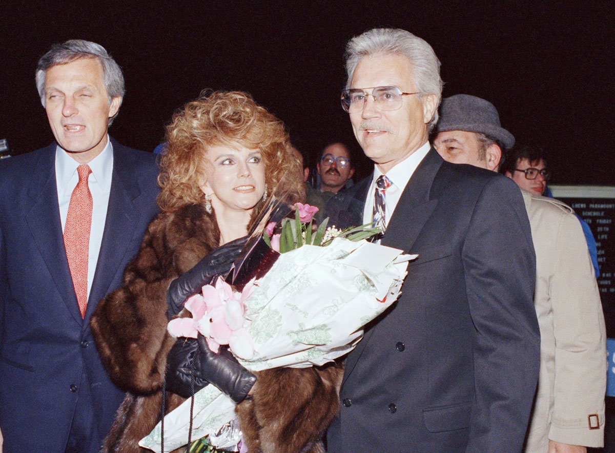 Alan Alda is joined by Ann-Margret and her husband, Roger Smith, at the premiere, Monday, March 21, 1988 of Alda?s new film, ?A New Life,? at New York?s Paramount Theater. In addition to Alda and Ann-Margret, the film stars Veronica Hamel and John Shea. (AP Photo/Ray Stubblebine)