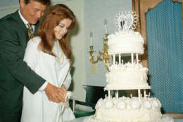 Actors Ann-Margret and Roger Smith are shown cutting the cake on their wedding day, May 8, 1967, in Las Vegas. (AP Photo)