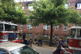 A DC Fire and EMS official says the investigation will take some time, but a preliminary finding into the fire's cause could be made public Tuesday. (WTOP/Dick Uliano)