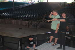 Billie Joe Armstrong of Green Day examines the pit seats to rip out with Seth Hurwitz. (Merriweather Post Pavilion)