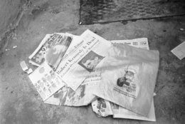 Newspapers, paper bag and an air travel guide which were found in the bed room of the Pax Hotel, where a man identifying himself as Ramon George Sneyd, are lying near a dust bin outside the hotel in Pimlico, London, on June 10, 1968. The proprietor of the hotel, Mrs. Anna Thomas said that Ramon George Sneyd lived in her hotel from June 5 to June 8. Ramon George Sneyd was arrested at Londons airport on June 8 for carrying a false passport and a loaded gun. United States Assistant Attorney General is seeking a speedy extradition for the man believed to be James Earl Ray, accused assassin of Dr. Martin Luther King. James Earl Ray had a preliminary hearing in court and was remanded in custody without bail until June 18. (AP Photo/F. Tewkesbury)