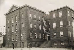 An undated photograph shows Thaddeus Stevens Elementary School. The photograph was probably in the 1950s based on other photos in the collection that depict fashions wore by the school children. The school building was originally constructed in 1868, the first public school for African-American children paid for by public funds. Until it was shuttered by then-schools chancellor Michelle Rhee's controversial reform measures in 2008, it was oldest surviving public school in D.C. still in operation The brick building was painted white in the 1970s. (Courtesy Charles Sumner School Museum and Archives)