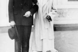 U.S. President Calvin Coolidge and first lady Grace Coolidge are shown with their dog at the White House portico in Washington, D.C., on Nov. 5, 1924.  (AP Photo)