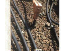 A few seals are missing on cables between East Falls Church and Ballston that are meant to keep water and dirt out. There are also cables lying on the ground in the area. (Courtesy FTA)