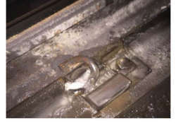 On the Red Line between Forest Glen and Silver Spring, tunnel leaks contribute to corrosion of this clip that holds the rail in place. (Courtesy FTA)