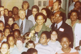 President Jimmy Carter poses for a photograph with students and staff members at Stevens Elementary. Jane Jackson Harley, the longtime school counselor who developed the school's innovative "extended-day" program -- the first at a D.C. school -- is at center of the photo. The program -- along with the arrival of the president's daughter -- boosted enrollment in the historic school and saved it from imminent closure. (Courtesy Jane Jackson Harley)