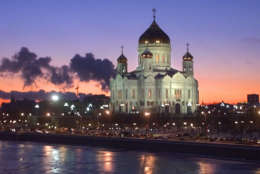 The giant Christ the Savior Cathedral dominates the skyline of downtown Moscow, Monday, Jan. 7, 2002  as Russians mark Christmas Day. The Russian and other eastern Orthodox churches adhere to the Julian calendar in which Christmas is celebrated  Jan. 6 and 7 by the Western calender. (AP Photo/Mikhail Metzel)