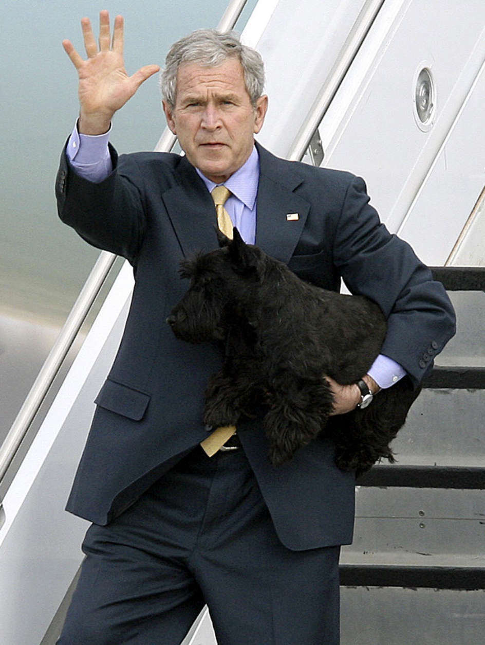  In this Feb. 29, 2008 file photo, President George W. Bush and his dog Barney step from Air Force One after arriving in Waco, Texas.  (AP Photo/Duane A. Laverty, File)