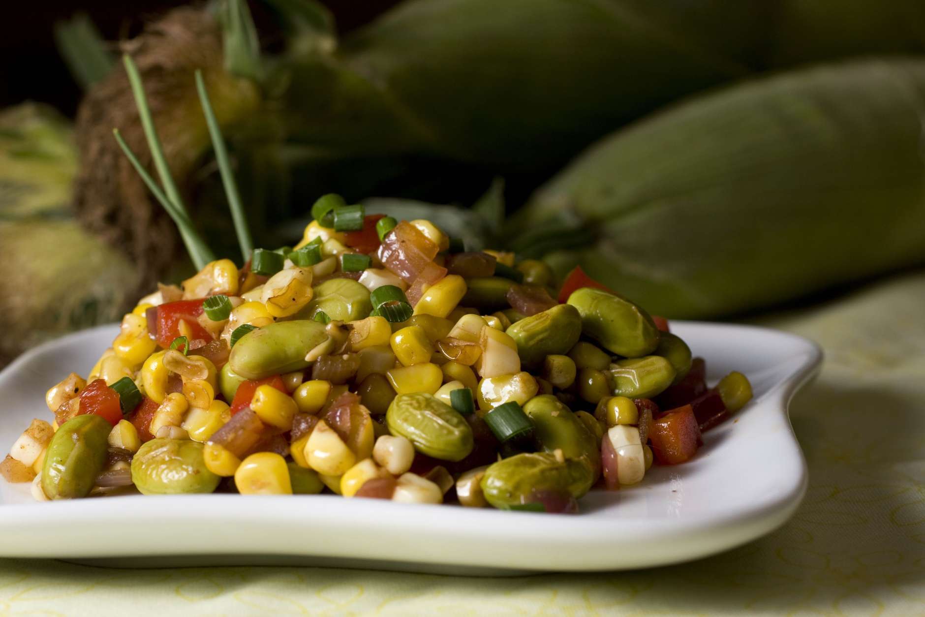 This photo taken May 25, 2009 shows Grilled Corn and Edamame Succotash. If tofu is not welcome on your plate but you want the health benefits try using edamame, a young soybean that has a nutty flavor and firm, but not hard, texture. Substituting edamame for the traditional lima beans this Grilled Corn and Edamame Succotash is a good side to your evening?s grilled entree. (AP Photo/Larry Crowe)