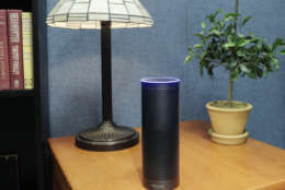 This July 29, 2015, file photo made in New York shows Amazon's Echo, a digital assistant that continually listens for commands such as for a song, a sports score or the weather. Starting Thursday, March 17, 2016, Amazons voice assistant will tell you how well you slept and how much more exercise you need, at least if you have a Fitbit fitness tracker and an Alexa-compatible device, such as Amazons Echo speaker and Fire TV streaming devices. (AP Photo/Mark Lennihan, File)