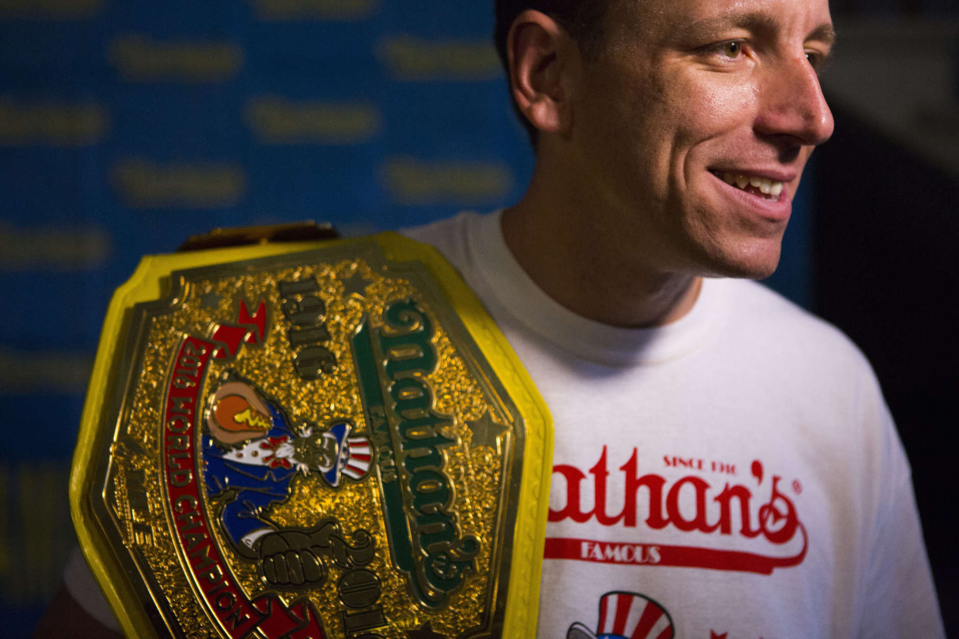 The current world hot dog eating champion, Joey Chestnut speaks to the media after the Nathan's Famous Hotdog eating contest weight in on Monday, July 3, 2017, in Brooklyn, New York. Chestnut weight in at 220.5 and will be defending his title from Matt Stonie who has defeat Chestnut in the past. (AP Photo/Michael Noble)