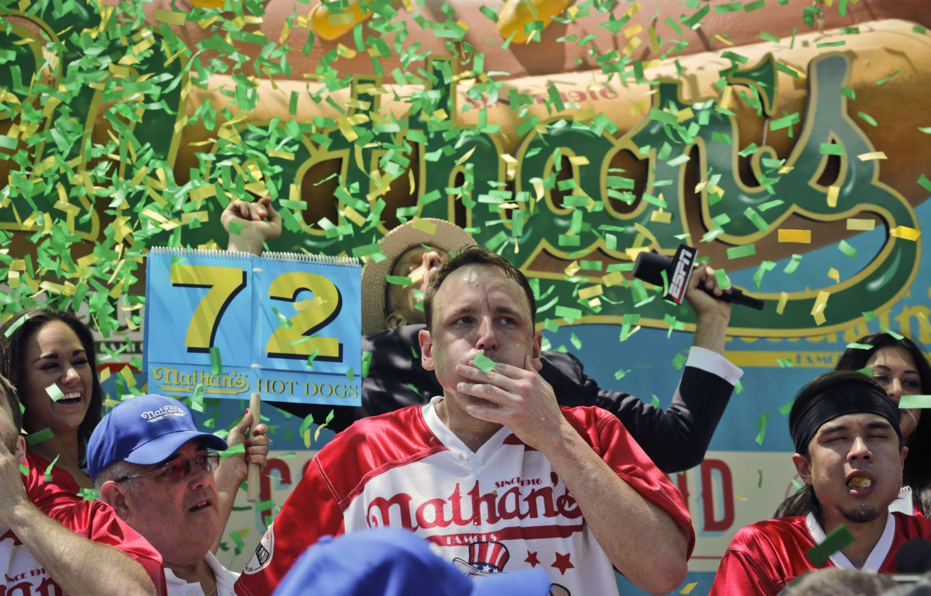 Joey Chestnut wins the Nathan's Annual Famous International Hot Dog Eating Contest, marking his 10th victory in the event, Tuesday July 4, 2017, in New York. (AP Photo/Bebeto Matthews)