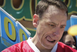 Joey Chestnut prepares for the start of the Nathan's Annual Famous International Hot Dog Eating Contest, Tuesday July 4, 2017, in New York. Chestnut won marking his 10th victory in the event. (AP Photo/Bebeto Matthews)