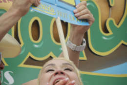 Miki Sudo eats her way to victory as the 2017 Women's Nathan Famous Hot Dog Eating Champion of the World after she consumed 41 hot dogs and buns in 10 minutes, Tuesday July 4, 2017, in New York. (AP Photo/Bebeto Matthews)