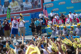 Chestnut ate 72 hotdogs in 10 minutes to claim his 10th win during Nathan's Famous Hotdog eating contest Tuesday, July 4, 2017, in Brooklyn, New York. (AP Photo/Michael Noble Jr.)