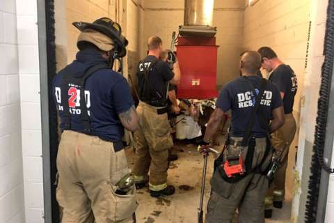 Man gets stuck inside trash chute in NW DC