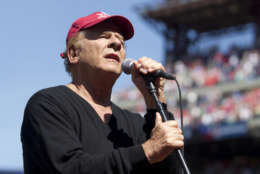 PHILADELPHIA, PA - JUNE 15: Grammy award winning singer Art Garfunkel sings 'God Bless America' in between the seventh inning of the game bewteen the Chicago Cubs and Philadelphia Phillies on June 15, 2014 at Citizens Bank Park in Philadelphia, Pennsylvania. (Photo by Mitchell Leff/Getty Images)